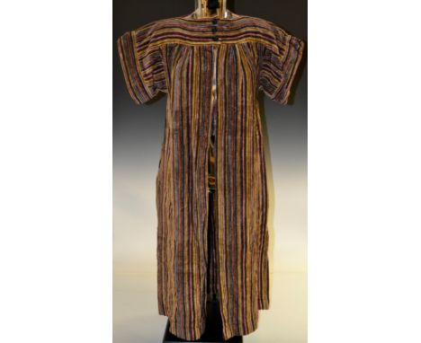 A Gina Fratini velveteen tunic, striped colours of burgundy, amber, orange; a Jean Patou  A line dress, plain black wool, but