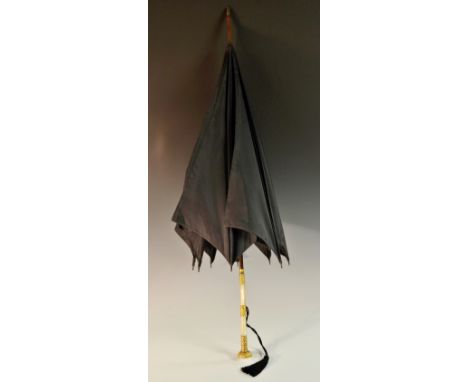 An early 20th century black silk parasol, by Laurus, S. Fox & Co Ltd, Paragon, bamboo shaft,  the mother of pearl handle with