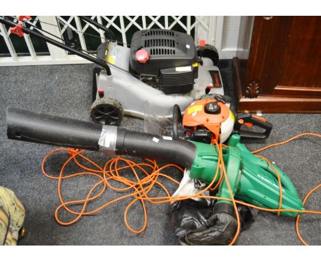Garden Equipment - a Black and Decker leaf blower; a Power G petrol lawnmower 