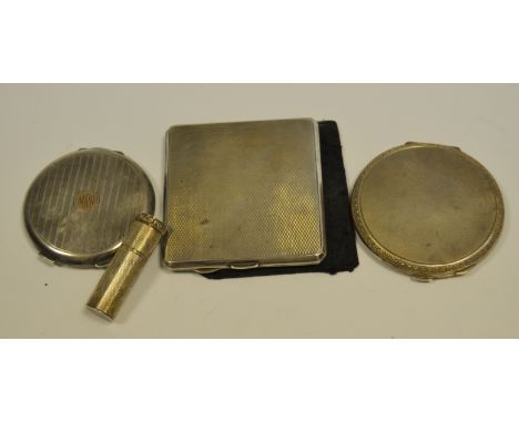 A silver lip stick holder, engine turned;  two silver compacts;  a silver cigarette case  (4)