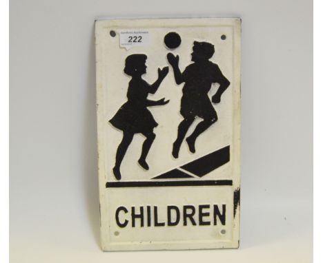 A cast iron 'Children Playing' wall sign 