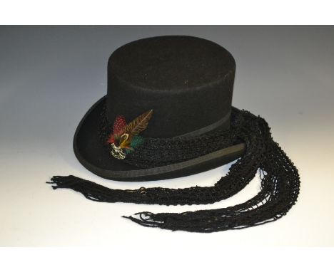 A felt top hat by DQT, removable decorative band and scarf, feather detail