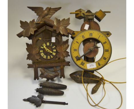 A mid 20th century German cuckoo clock;  a German wooden movement clock (2)