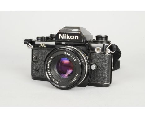 A Nikon FA SLR Camera, black, serial no 5142004, shutter working, timer working, body F-G, extensive brassing, some scratches