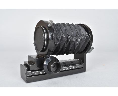 A Leitz Wetzlar Universal Focusing Bellows-R, maximum extension 100mm, rotatable scale rod for reproduction ratios for 90mm, 