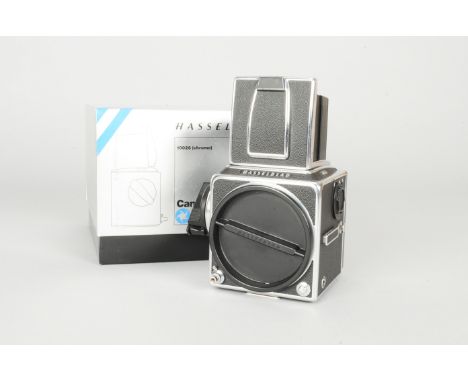 A Hasselblad 503 CX Camera Body, chrome, serial no RR 1416408, shutter working, body VG, with caps, in maker's box, manual, w