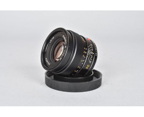 A Leitz Canada Elmarit-R 90mm f/2.8 Lens, serial no 3344853, 1984, triple-cam, barrel VG, elements G-VG, with rear cap and no