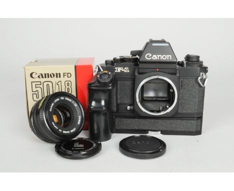 A Canon F-1N SLR Camera, serial no 134031, AE finder, shutter working on auto and manual, body G-VG, foam particles on edge o