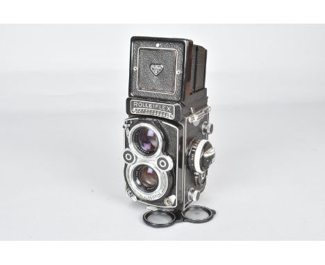 A Rolleiflex 3.5F Model 1 K4E TLR Camera, serial no 2210125, shutter working, button slow to reset, meter responds to light, 