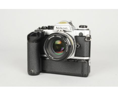 A Nikon FE 2 SLR Camera, chrome, serial no 2007878, shutter working, timer working, body VG, some scratches to base, with Nik