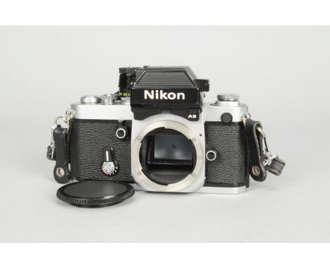 A  Nikon F2 Photomic AS SLR Camera Body chrome, serial no 7301685, shutter working, timer working, body VG, some brassing to 