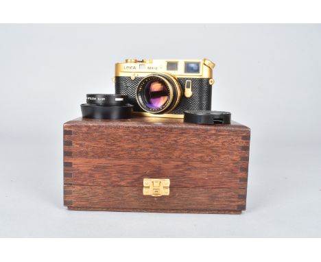 A Leica M4-2 Gold Rangefinder Camera, serial no 1527380, 1979, a Leitz Canada special edition to celebrate the centenary of O