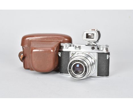 A Voigtländer Prominent I Rangefinder Camera, serial no B64929, accessory shoe, lever wind, bright-line viewfinder, body G, S