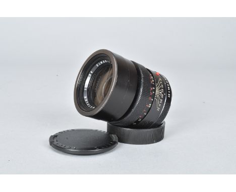 A Leitz Wetzlar Elmarit-R 90mm f/2.8 Lens, serial no 2012998, 1965, triple-cam, barrel F, elements G, dust, with front and re