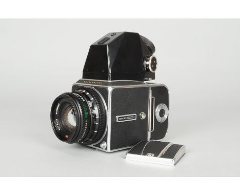 A Hasselblad 500C/M Camera, chrome, serial no RH 1272485, shutter working, body G-VG, with Carl Zeiss Planar T* 80mm f/2.8 le