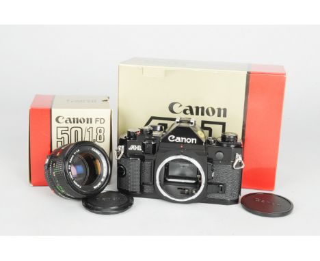 A Canon A-1 SLR Camera,  serial no 1471563, shutter and metering working, shutter squeeks, body VG-E, with a Canon FD 50mm f/