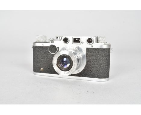 A Leica IIC Rangefinder Camera, serial no 440885, 1949-51, body G, rust spots to accessory shoe, shutter working, with a Leit