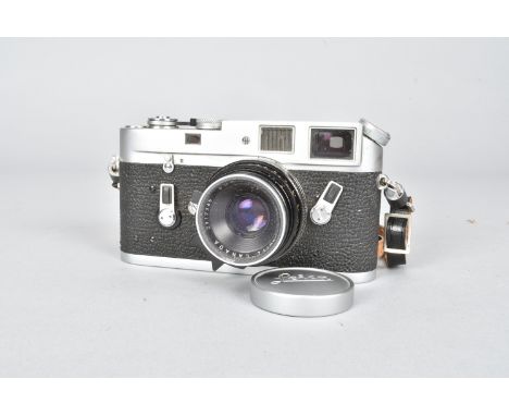 A Leica M4 Rangefinder Camera,  serial no 1191067, 1968/9, shutter working, self-timer working, body F, some scuffing, paper 