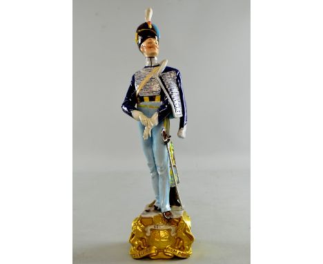 Dresden porcelain figure of a military officer  in light and dark blue  uniform 30cm high 