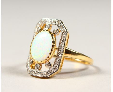 A GILSON OPAL, SILVER AND GOLD PLATED RING.