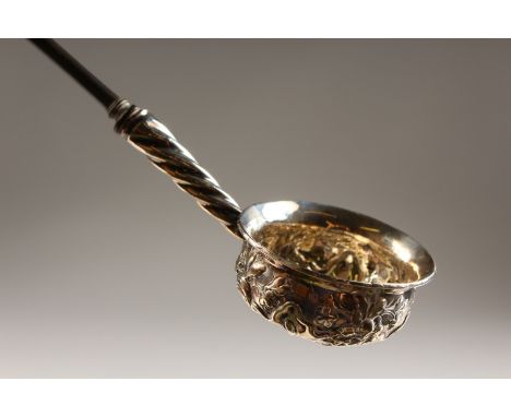 A GEORGIAN TODDY LADLE with turned wood handle. 13ins long.