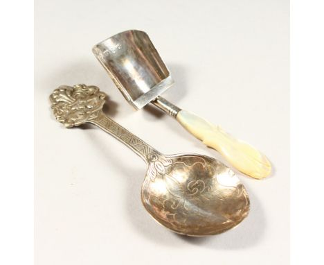 A GEORGE III CADDY SPOON, with mother-of-pearl handle, Birmingham 1790, Maker: J.L., and A GOTHIC SPOON (2).
