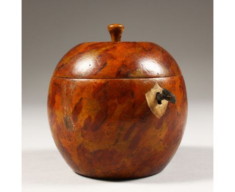 AN ORANGE TEA CADDY. 5ins high.