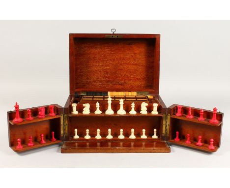 A GOOD VICTORIAN MAHOGANY GAMES COMPENDIUM, opens to reveal chess set, draughts, cards, cribbage, horse racing, tiddlywinks, 