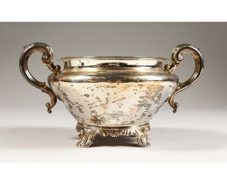 A WILLIAM IV TWO HANDLED SUGAR BASIN on four acanthus rounded feet. London 1835. Weight 10ozs.
