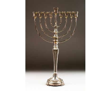 A STERLING .925 SILVER MENORAH. 21inshigh.