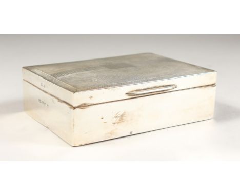 A ENGINE TURNED TWO DIVISION CIGARETTE BOX. 5ins long. Birmingham 1958.