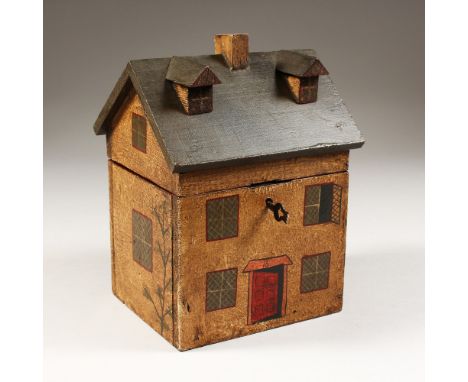 A PAINTED HOUSE TEA CADDY, the lid opens to reveal an interior. 9ins high.