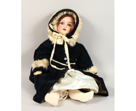 A SCHOENAU &amp; HOFFMEISTER "PB STAR", No. 1909, Size 7.5, BISQUE HEADED DOLL, wearing a velvet cloak. 25ins long.