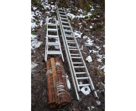 AN ALUMINIUM EXTENSION LADDER with 13 rungs to each 3.5m section, a step ladder and a bundle of 7 wooden roller blinds ( 6@89