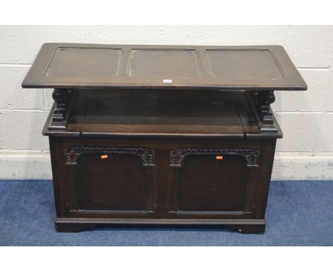 AN OAK MONKS BENCH, width 107cm x depth 45cm x height 73cm