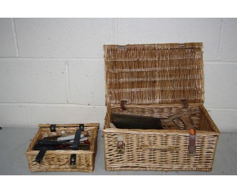 A SMALL FORTUM AND MASONS HAMPER BASKET and a small basket containing tools including scrapers, a tenon saw, screwdrivers etc
