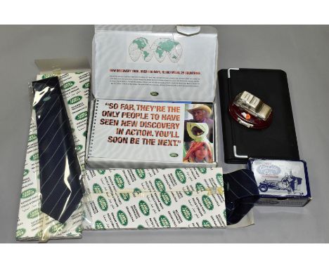 TWO BOXED GENUINE LAND ROVER FORMAL TIES, part no. RTC 6893, in original boxes, with a branded wallet containing a Range Rove