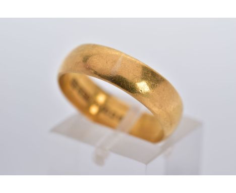 A 22CT GOLD WIDE BAND, of a plain polished design hallmarked 22ct gold London, ring size P½, approximate gross weight 5.7 gra