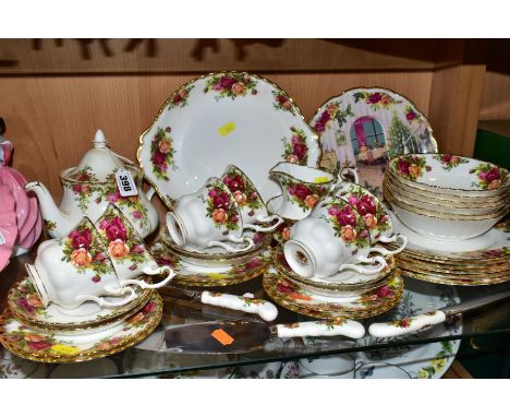 ROYAL ALBERT 'OLD COUNTRY ROSES', comprising teapot, height 16cm, cake/sandwich plate, milk jug, sugar bowl, six 21cm plates 