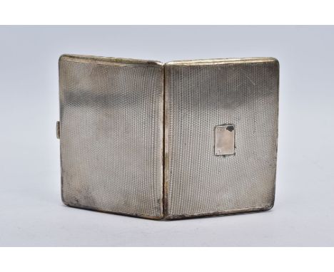 A SILVER CIGARETTE CASE, of a rectangular shape, engine turn design with a vacant cartouche to the front, hallmarked Birmingh