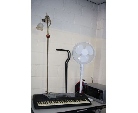 A YAMAHA PSR 175 KEYBOARD WITH STAND (no charger) , a Sharp Microwave, a Pedestal Fan, a 30 metre power extension reel and a 