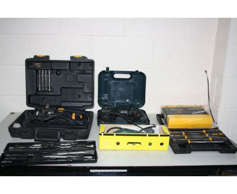 A PERFORMANCE PRO ROTARY SDS HAMMER DRILL, a Black and Decker hammer drill, a Bocsh detail sander , a cased set of JCB files 