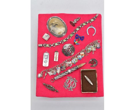 A SELECTION OF SILVER AND WHITE METAL ITEMS, to include two silver ingot pendants with hallmarks for Birmingham 1977/1980, a 