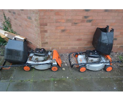 TWO FLYMO PETROL LAWN MOWERS with Briggs and Stratton engine and grass box ( engine pulls freely but hasn't been started) (2)