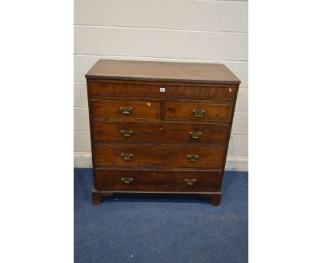 AN EARLY 20TH CENTURY OAK CHEST OF TWO OVER FOUR LONG DRAWERS, long secret frieze drawer, brass swan neck handles, on bracket