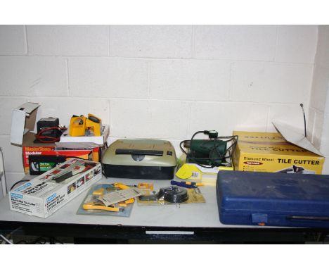 A BOSCH PHG 2 HEAT GUN, a Plasplugs Modular Sharpening System, a Fellows Paper and Credit Card Shredder (not working), a case