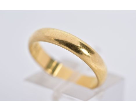 AN 18CT GOLD BAND, of a plain polished design, hallmarked 18ct gold London, ring size P, approximate gross weight 4.5 grams