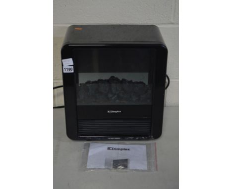 A DIMPLEX ELECTRIC MINI FIRE, with manual (PAT pass and working)