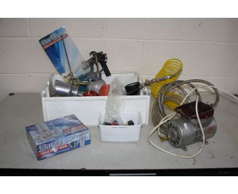 A SPRAVIT MODELLERS COMPRESSOR and a tray containing air tools including , tyre inflators, spray guns, etc (PAT fail due to b