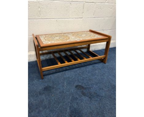 A TEAK TILE TOP COFFEE TABLE